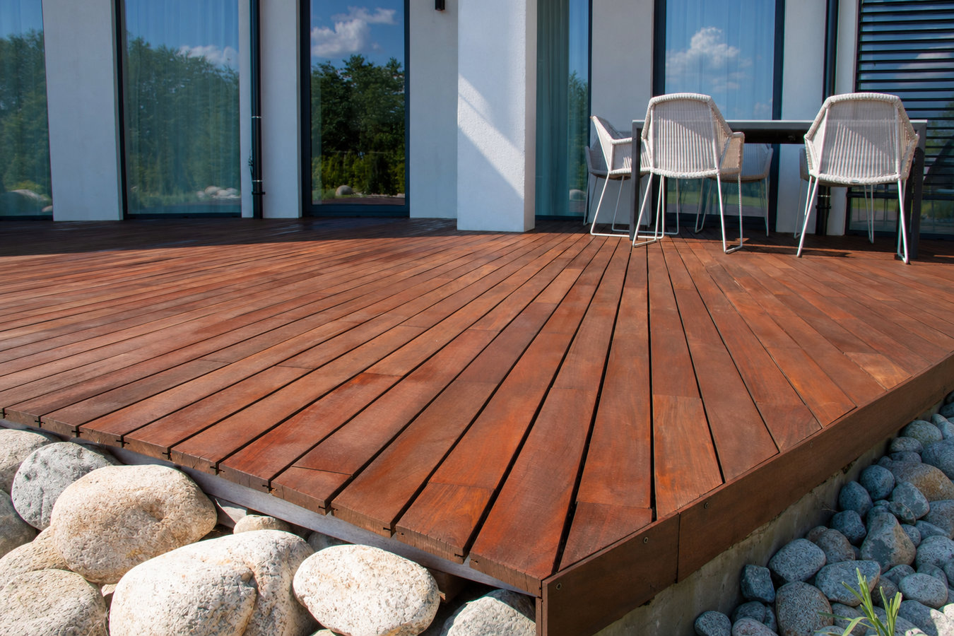 Pressure-treated wood deck construction